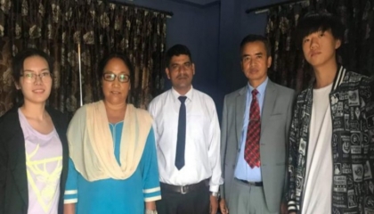 Volunteer students with Nepal school principals
